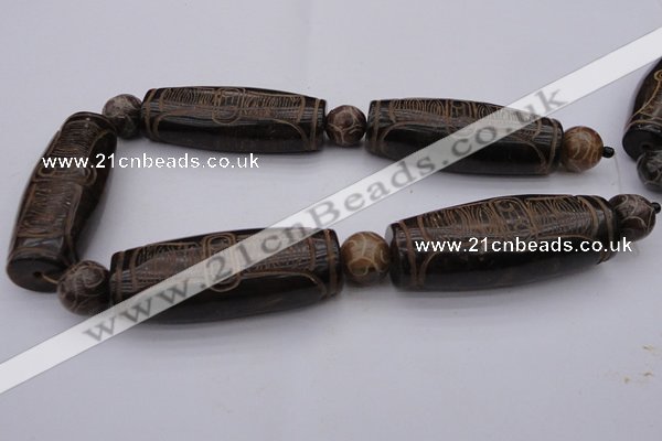 CAL04 14.5 inches 25*60mm carved drum agalmatolite beads