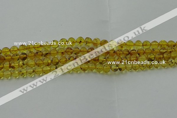 CAR521 15.5 inches 5mm - 6mm round natural amber beads wholesale