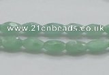 CBJ12 15.5 inches 6*10mm faceted rice jade beads wholesale