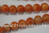 CCA303 15.5 inches 10mm round orange calcite gemstone beads wholesale