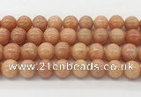 CCA517 15.5 inches 12mm round peach calcite gemstone beads