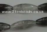 CCQ289 15.5 inches 10*25mm faceted rice cloudy quartz beads