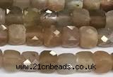 CCU1012 15 inches 4mm faceted cube sunstone beads