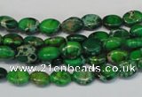 CDE178 15.5 inches 6*8mm oval dyed sea sediment jasper beads