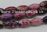 CDE30 15.5 inches 8*12mm rice dyed sea sediment jasper beads