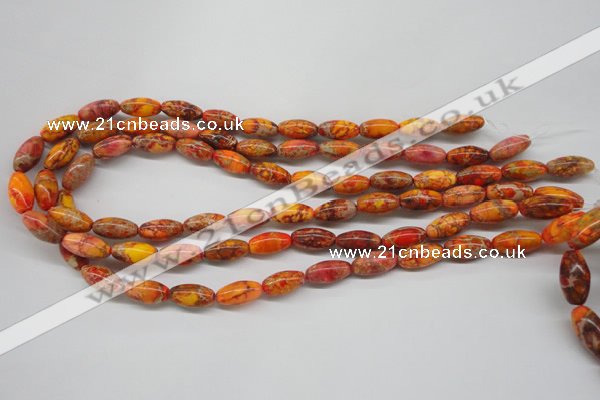 CDE510 15.5 inches 8*16mm rice dyed sea sediment jasper beads