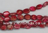 CDE641 15.5 inches 6*8mm oval dyed sea sediment jasper beads