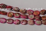 CDE781 15.5 inches 6*8mm oval dyed sea sediment jasper beads