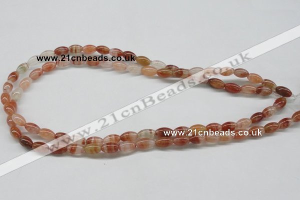 CDQ30 15.5 inches 6*10mm rice natural red quartz beads wholesale