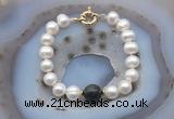 CFB1056 Hand-knotted 9mm - 10mm potato white freshwater pearl & golden obsidian bracelet