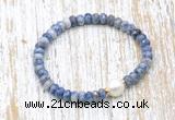 CFB718 faceted rondelle blue spot stone & potato white freshwater pearl stretchy bracelet