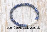 CFB773 faceted rondelle lapis lazuli & potato white freshwater pearl stretchy bracelet