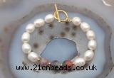 CFB963 Hand-knotted 9mm - 10mm rice white freshwater pearl & botswana agate bracelet
