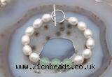 CFB992 Hand-knotted 9mm - 10mm rice white freshwater pearl & candy jade bracelet