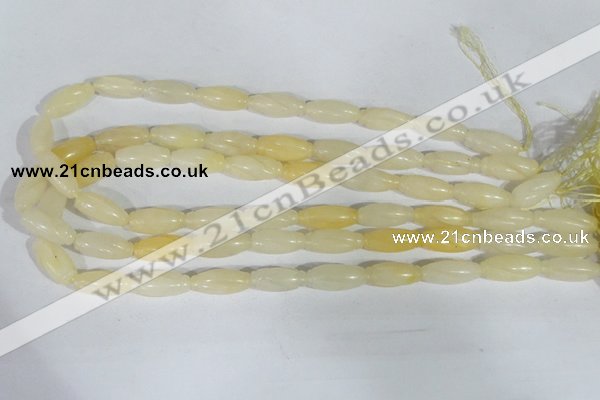 CFG552 15.5 inches 8*20mm carved rice yellow aventurine beads