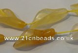 CFG561 15.5 inches 14*28mm carved trumpet flower yellow aventurine beads