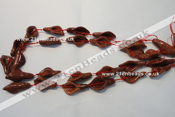 CFG568 15.5 inches 14*28mm carved trumpet flower goldstone beads
