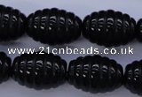 CFG759 15.5 inches 15*20mm carved rice black agate beads