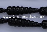 CFG761 15.5 inches 10*35mm carved teardrop black agate beads