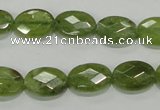 CGA101 15.5 inches 10*14mm faceted oval natural green garnet beads