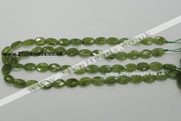 CGA101 15.5 inches 10*14mm faceted oval natural green garnet beads