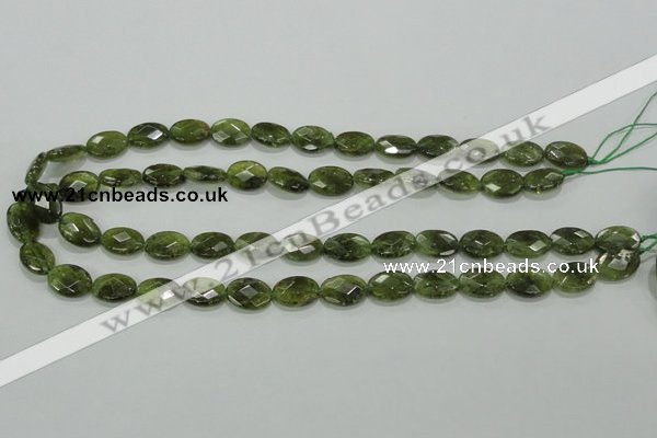 CGA107 15.5 inches 10*14mm faceted oval natural green garnet beads