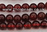 CGA601 15.5 inches 6mm A grade round natural orange garnet beads