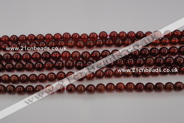 CGA602 15.5 inches 8mm A grade round natural orange garnet beads