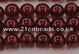 CGA608 15.5 inches 7mm AA grade round natural orange garnet beads