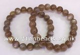 CGB4549 7.5 inches 9mm - 10mm round sunstone beaded bracelets