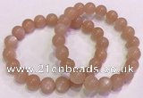 CGB4588 7.5 inches 10mm - 11mm round sunstone beaded bracelets