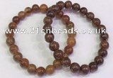 CGB4601 8mm - 9mm round golden rutilated quartz beaded bracelets