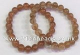 CGB4613 8mm - 9mm round golden rutilated quartz beaded bracelets