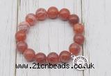 CGB6864 10mm, 12mm fire agate beaded bracelet with alloy pendant