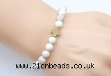 CGB9351 8mm, 10mm white howlite & cross hematite power beads bracelets