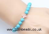 CGB9352 8mm, 10mm blue howlite & cross hematite power beads bracelets