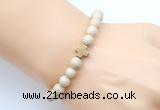 CGB9360 8mm, 10mm white fossil jasper & cross hematite power beads bracelets