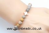 CGB9434 8mm, 10mm matte fossil coral & cross hematite power beads bracelets