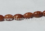 CGS69 15.5 inches 6*10mm rice goldstone beads wholesale