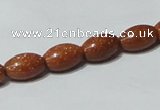 CGS70 15.5 inches 8*12mm rice goldstone beads wholesale