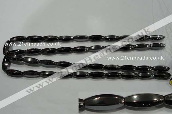 CHE141 15.5 inches 8*20mm faceted rice hematite beads wholesale