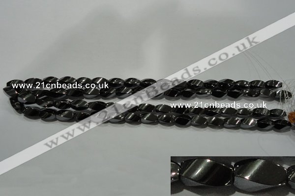 CHE161 15.5 inches 6*12mm twisted rice hematite beads