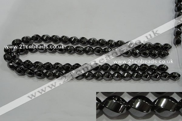 CHE166 15.5 inches 10*12mm twisted rice hematite beads