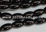 CJB53 15.5 inches 10*16mm rice natural jet gemstone beads