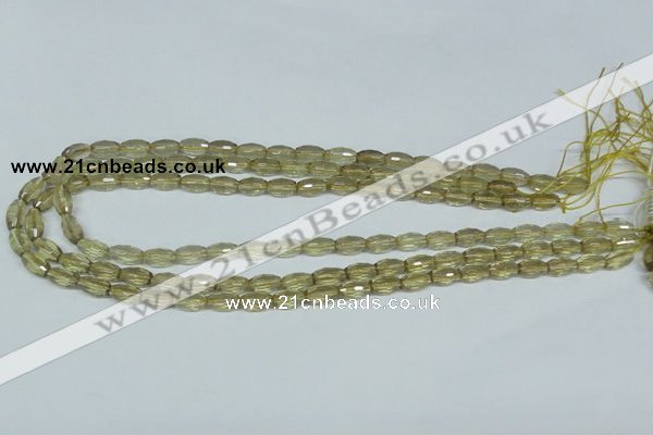 CLQ10 15.5 inches 6*10mm faceted rice natural lemon quartz beads