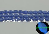 CLU181 15.5 inches 10*14mm oval blue luminous stone beads