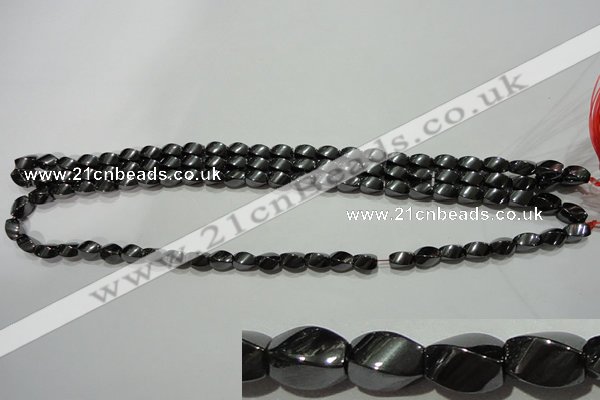 CMH151 15.5 inches 5*8mm twisted rice magnetic hematite beads