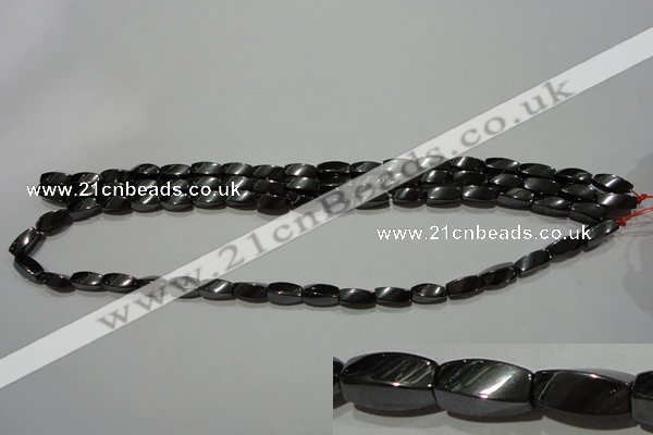 CMH152 15.5 inches 5*11mm twisted rice magnetic hematite beads