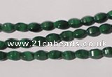 CMN222 15.5 inches 4*6mm faceted rice natural malachite beads