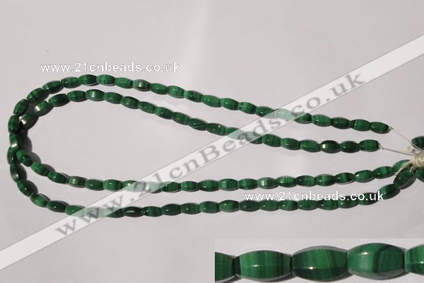 CMN223 15.5 inches 5*9mm faceted rice natural malachite beads